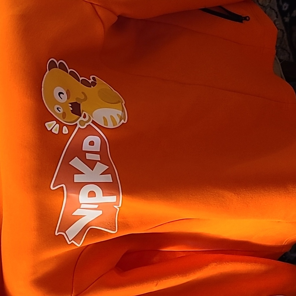 VIPKid zip up orange jacket